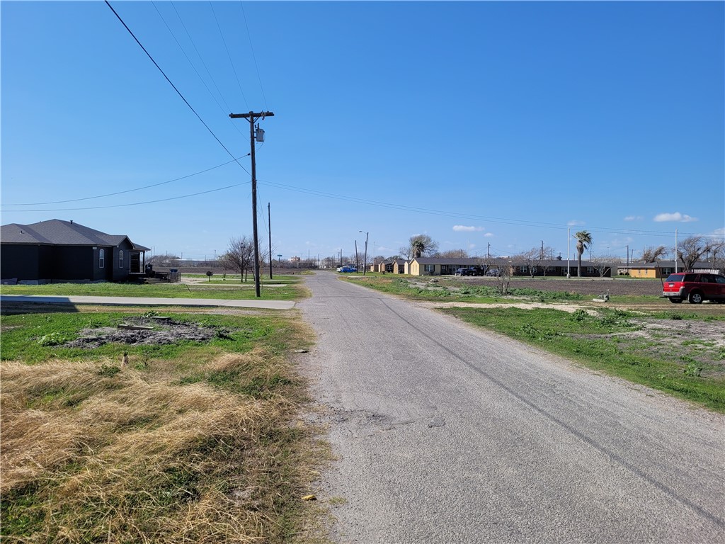 205 Polk Street Gregory, TX 78374 - Photo 3 of 5 a view of a golf course with a car park