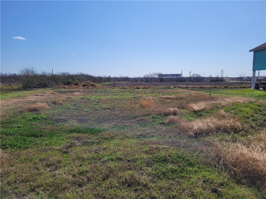 205 Polk Street Gregory, TX 78374 - Photo 5 of 5 a view of a lake view and mountain view