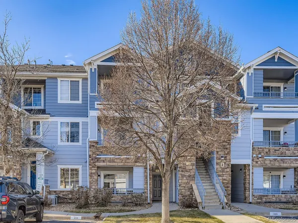 a front view of a building with yard