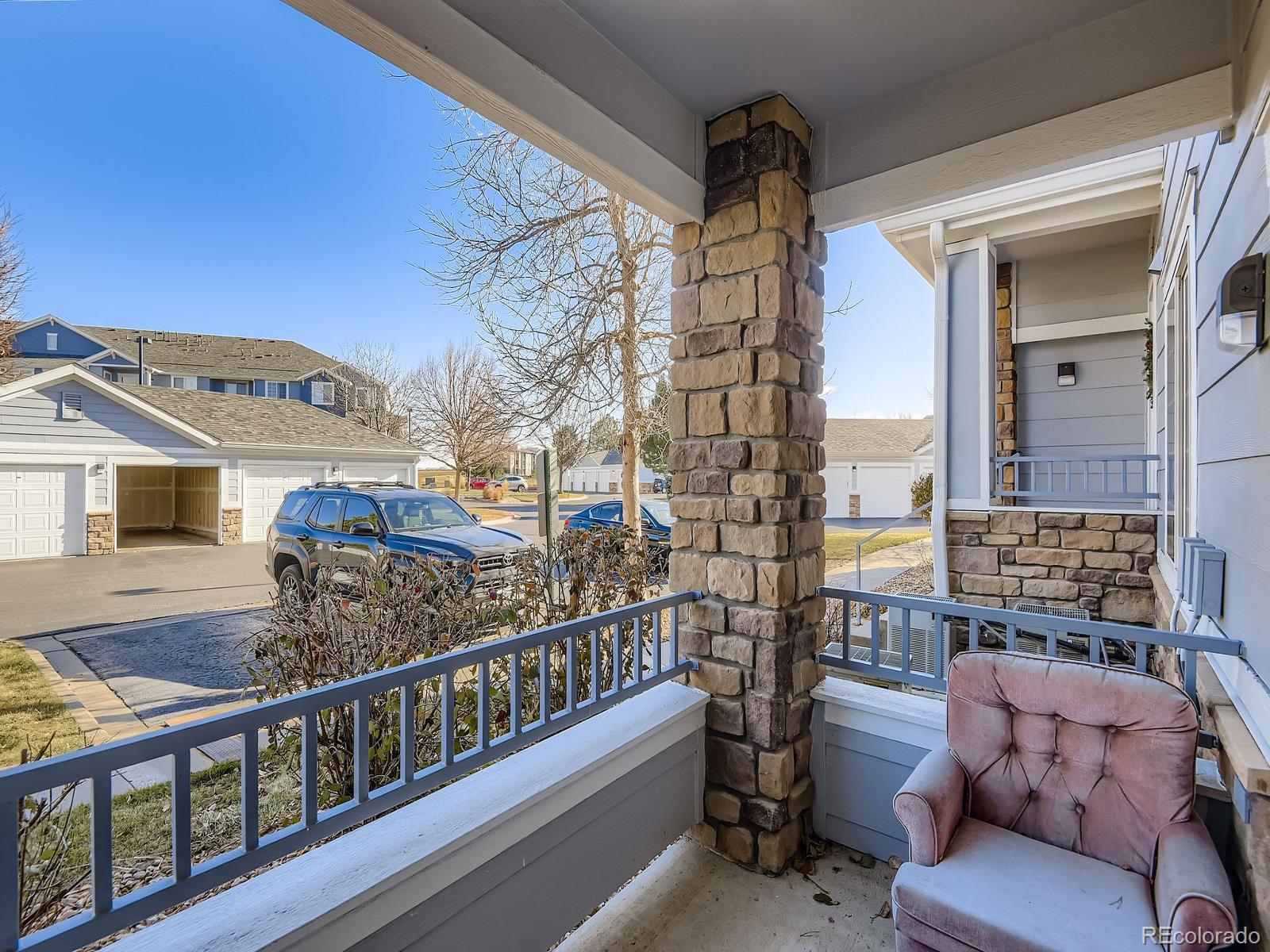 5255 Memphis Street, Unit 307 Denver, CO 80239 - Photo 13 of 29 a view of a balcony with furniture