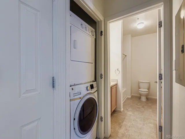 a view of a bathroom with a washer and dryer
