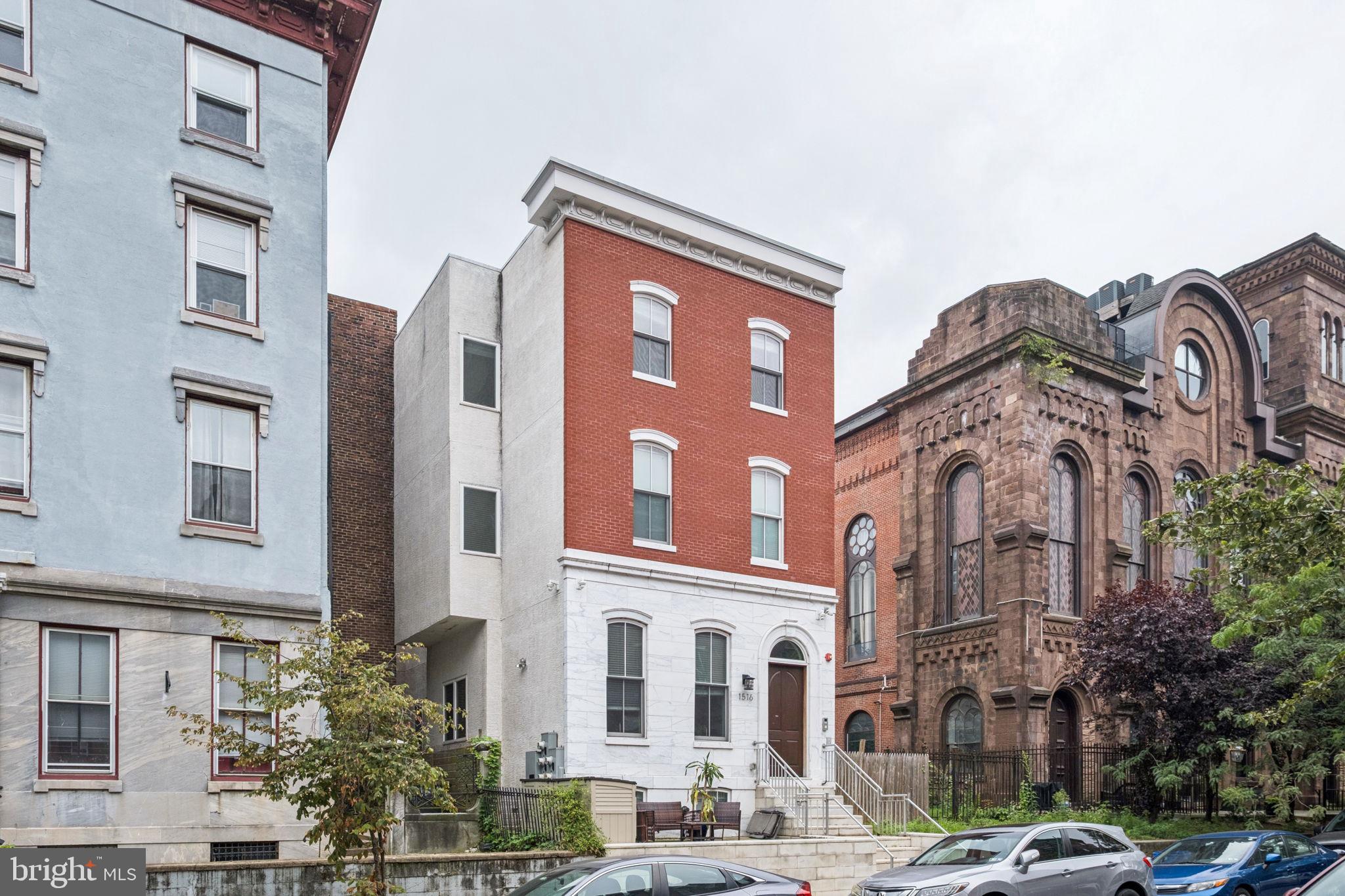 1516 Green Street Philadelphia, PA 19130 - Photo 2 of 36 a front view of a multi story building