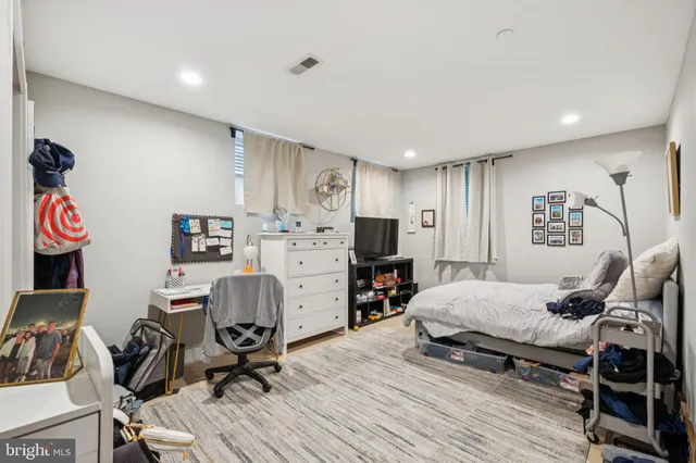 a bedroom with furniture and a bed