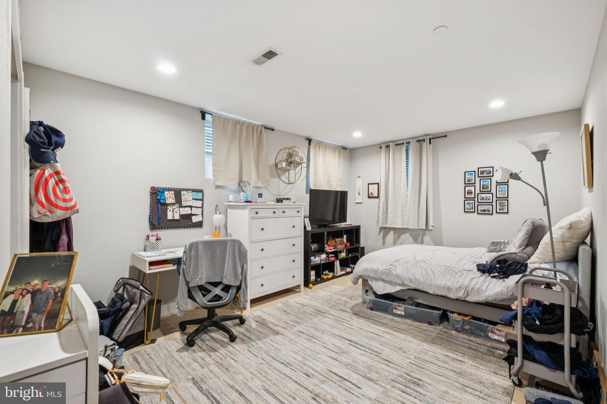 1516 Green Street Philadelphia, PA 19130 - Photo 28 of 36 a bedroom with furniture and a bed