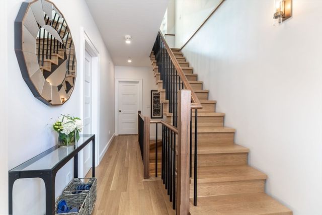 a view of entryway with wooden floor