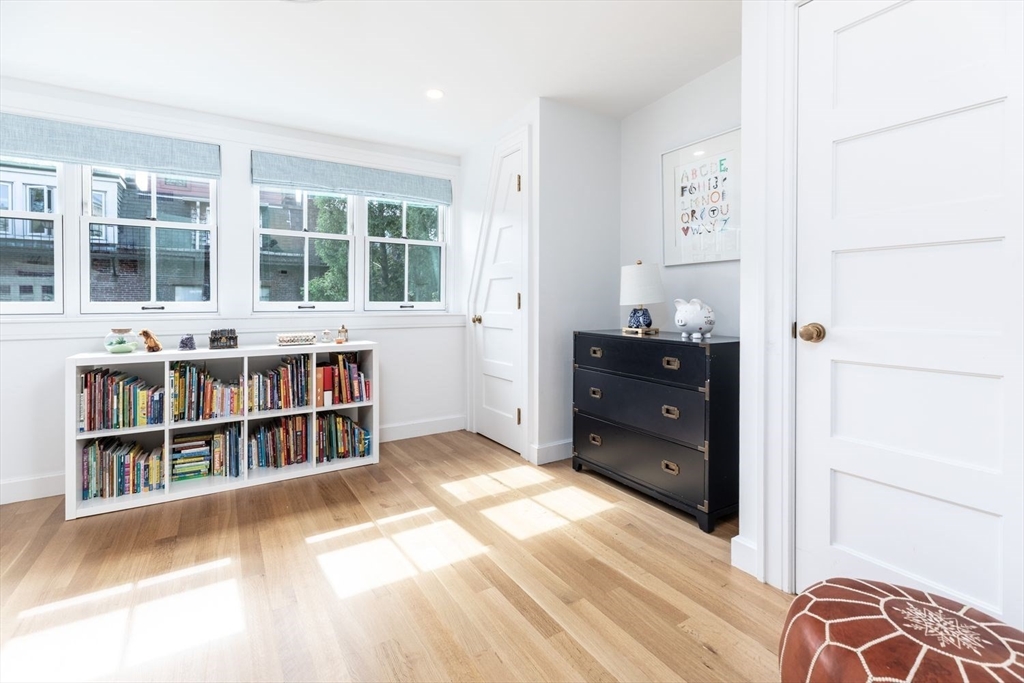 27 Lawrence Street Boston, MA 02116 - Photo 22 of 38 a view of a bedroom with furniture and window