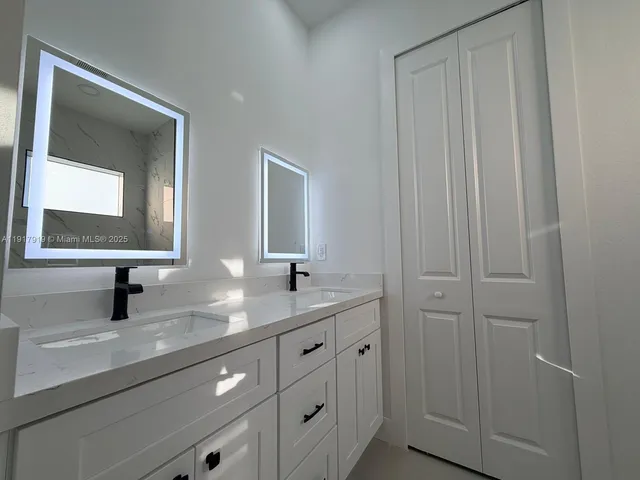 a view of an empty walk in closet