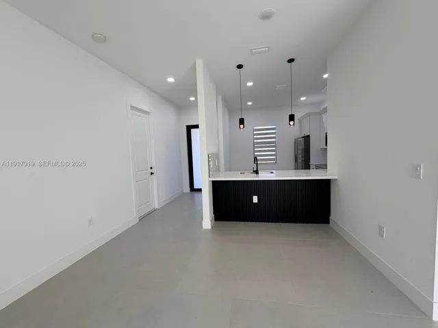 $2,000 | 1144 Mobley Street East, Lehigh Acres, FL 33974