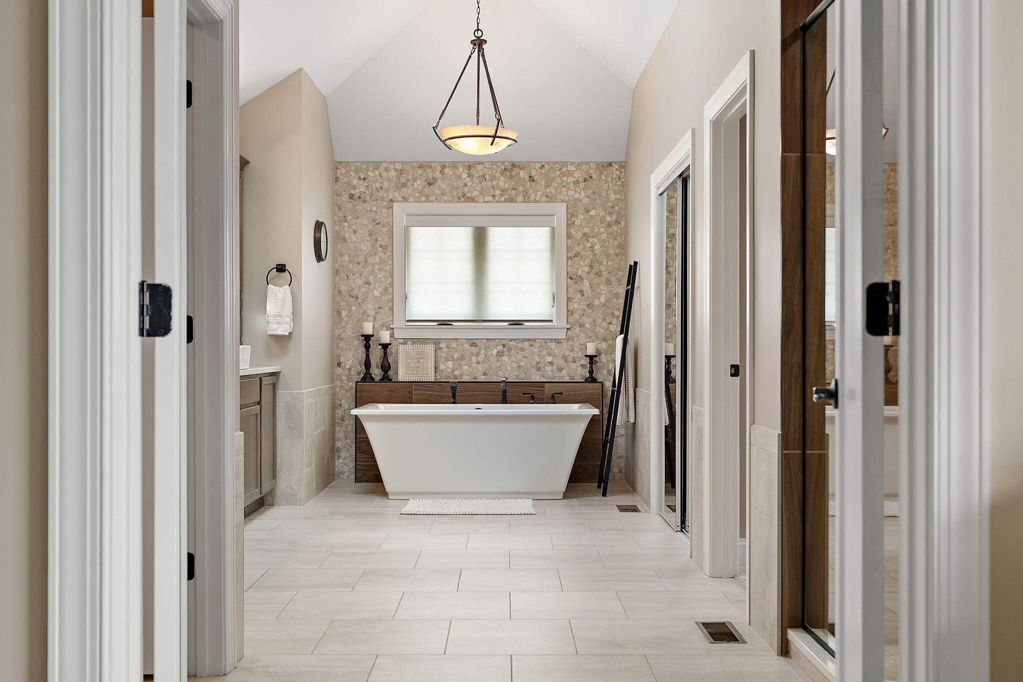 9192 Michigan Drive Crown Point, IN 46307 - Photo 40 of 66 a bathroom with a bathtub and shower