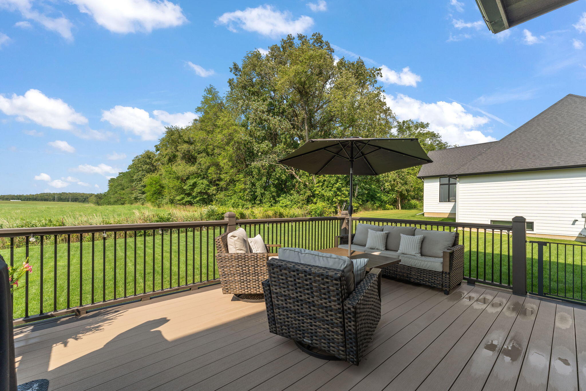 9192 Michigan Drive Crown Point, IN 46307 - Photo 56 of 66 a view of balcony with outdoor seating and wooden floor