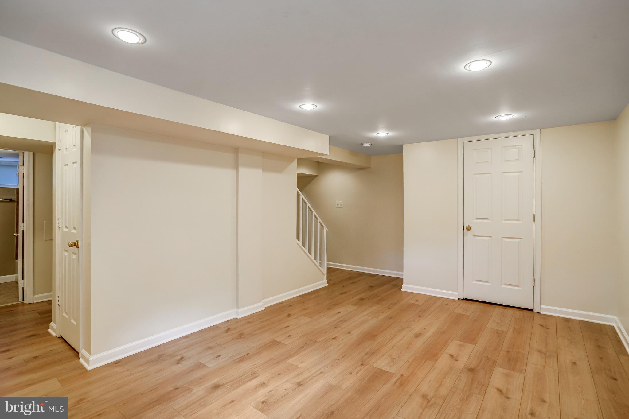 9210 Glenville Road Silver Spring, MD 20901 - Photo 35 of 46 Lower level with new flooring