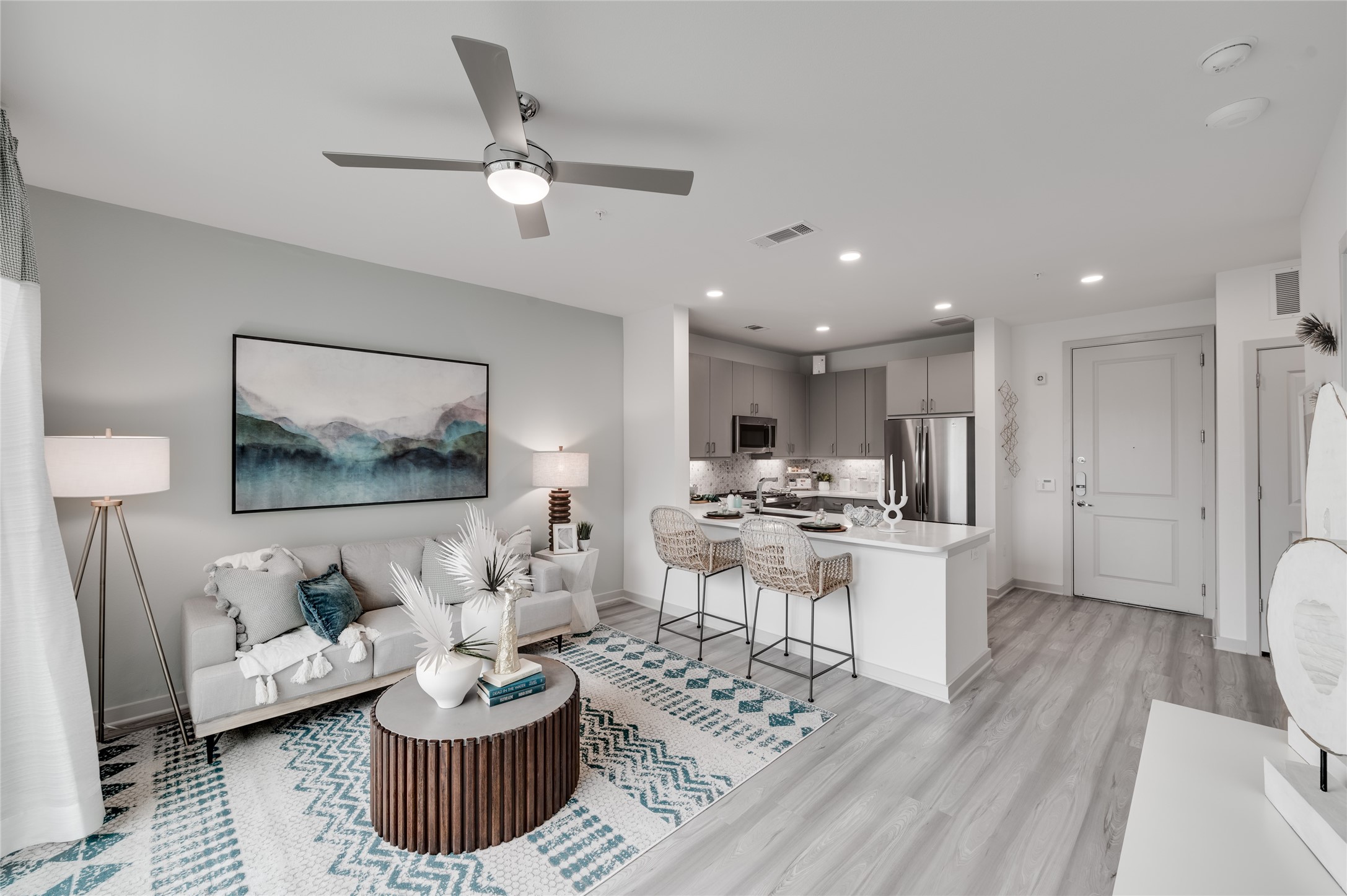 3636 West Dallas Street, Unit 356 Houston, TX 77019 - Photo 3 of 10 Designed for both entertaining and everyday comfort, the spacious living and dining areas blend modern elegance with refined functionality.