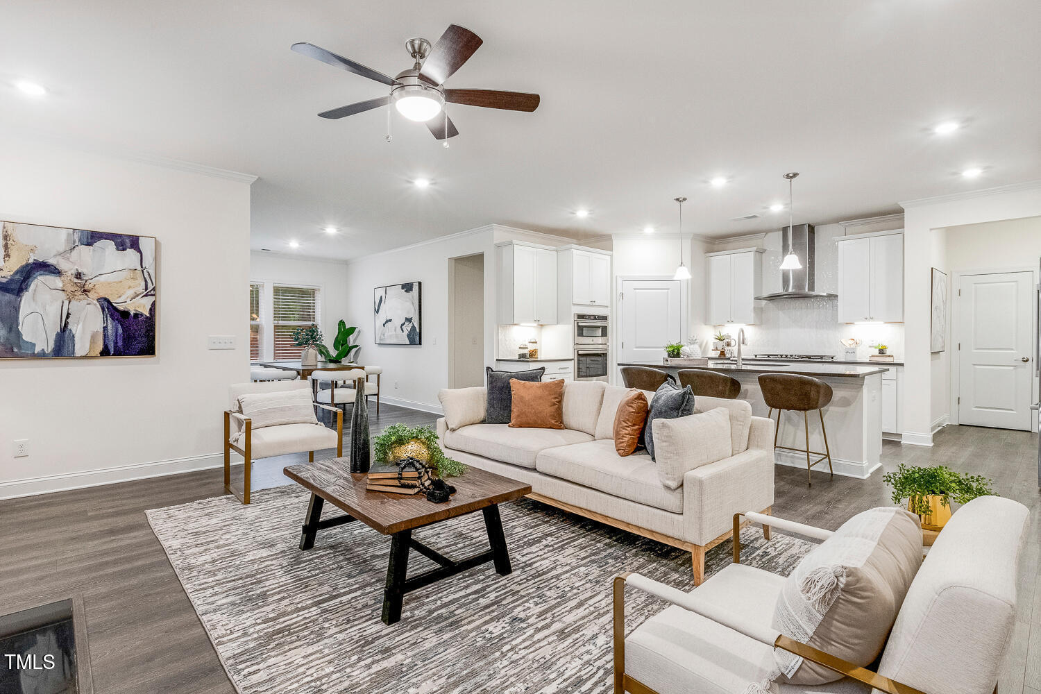 1116 Ciandra Barn Way Apex, NC 27523 - Photo 15 of 59 a living room with furniture and kitchen view