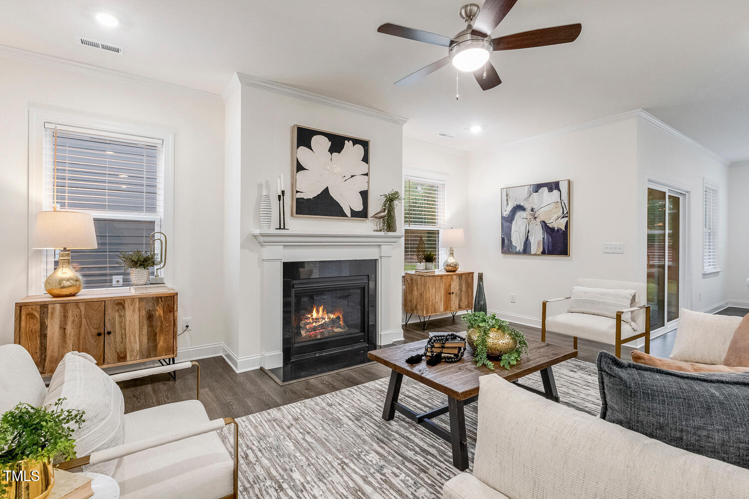 1116 Ciandra Barn Way Apex, NC 27523 - Photo 18 of 59 a living room with furniture and a fireplace