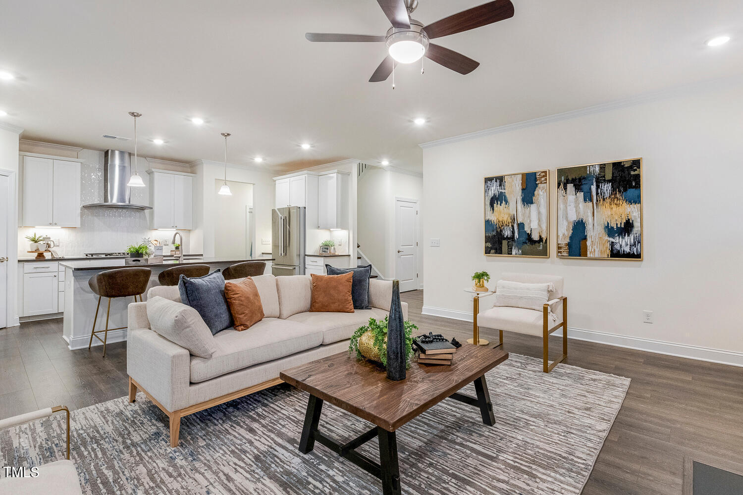 1116 Ciandra Barn Way Apex, NC 27523 - Photo 20 of 59 a living room with furniture and kitchen view