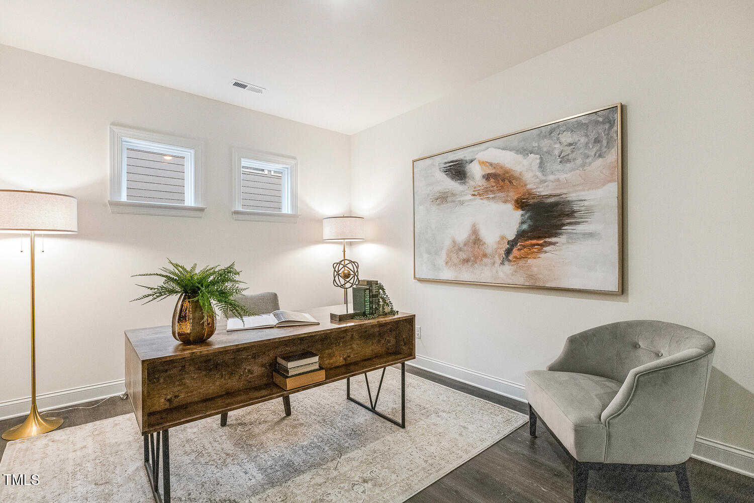 1116 Ciandra Barn Way Apex, NC 27523 - Photo 22 of 59 a workspace with furniture and a potted plant