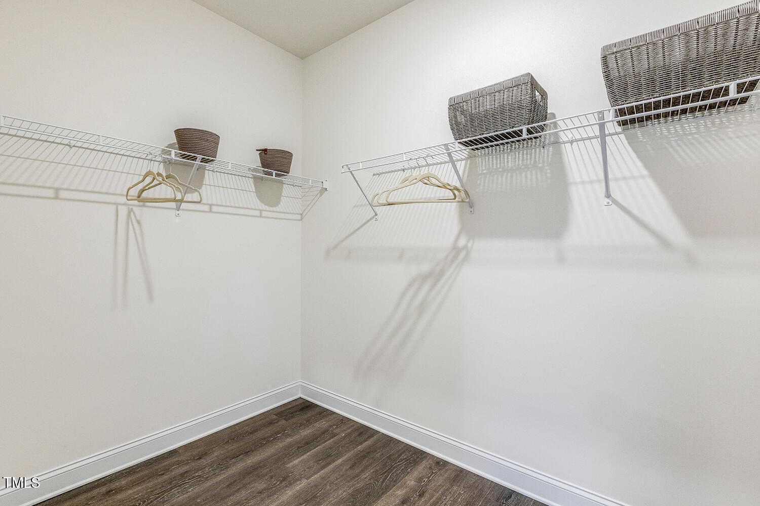 1116 Ciandra Barn Way Apex, NC 27523 - Photo 29 of 59 a view of small space with empty racks on the wall