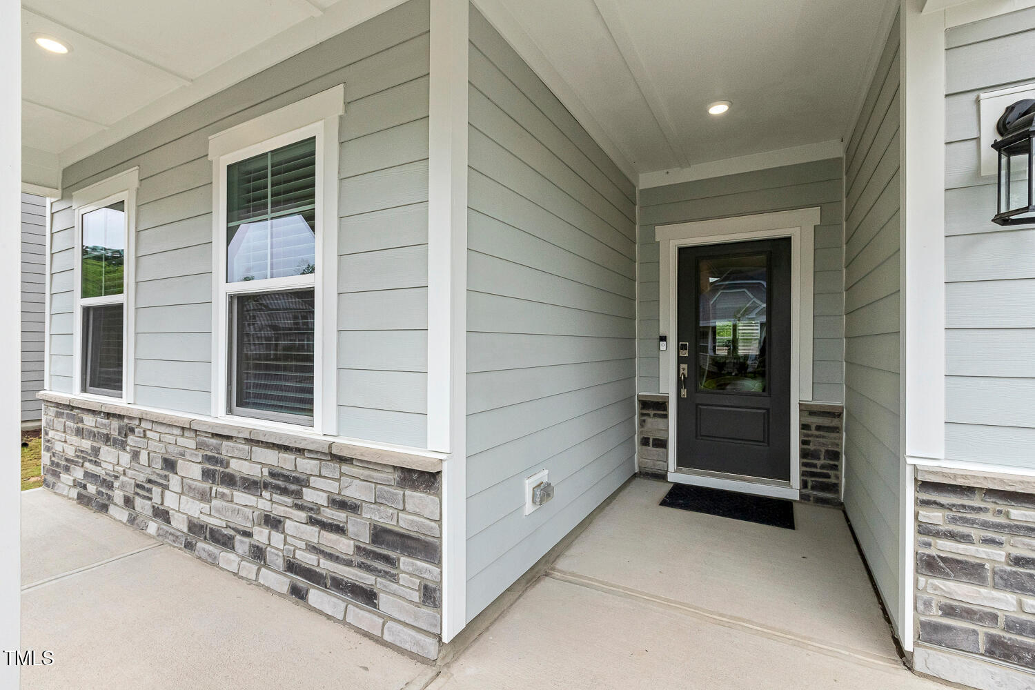 1116 Ciandra Barn Way Apex, NC 27523 - Photo 3 of 59 front view of a house with a door and a window