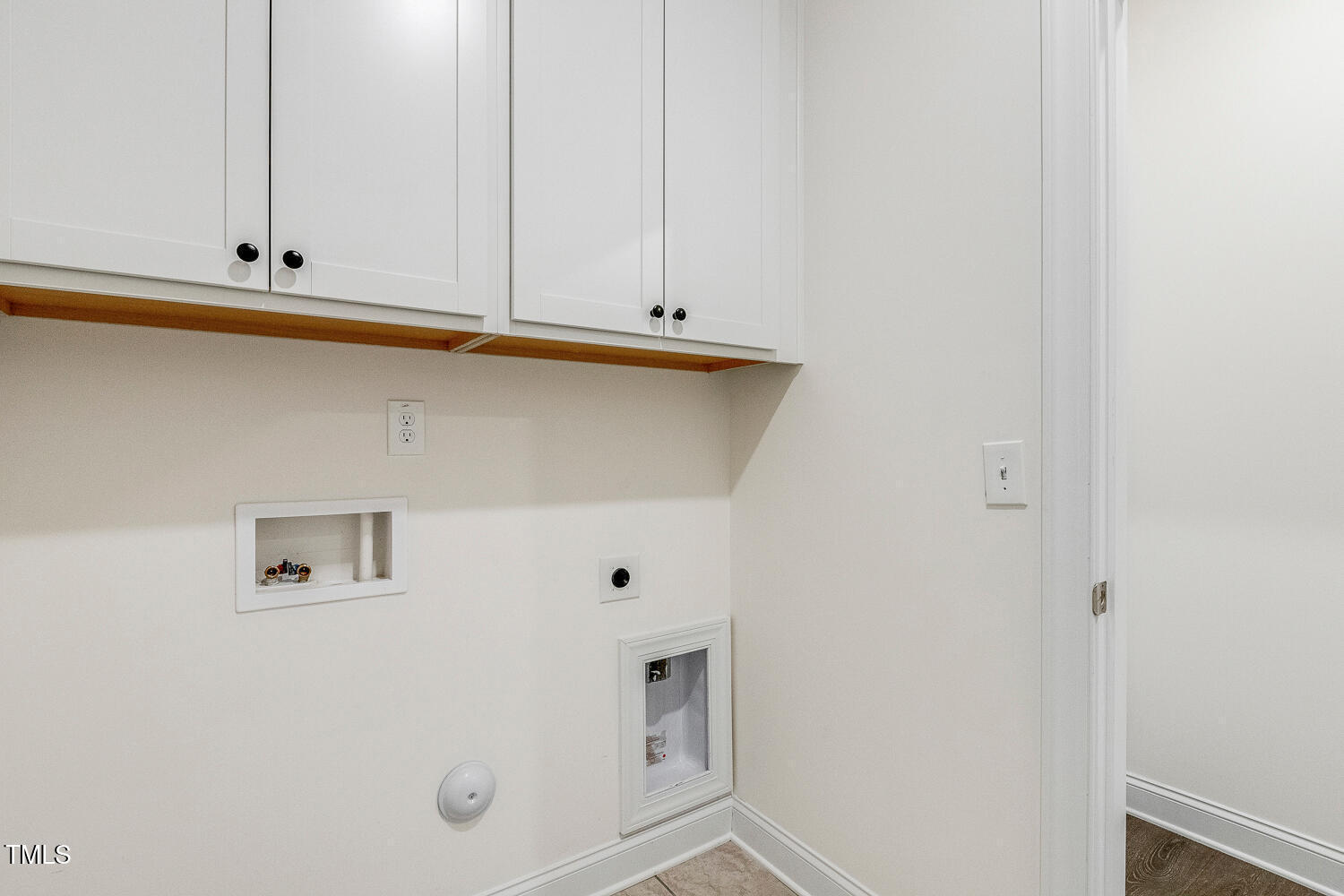 1116 Ciandra Barn Way Apex, NC 27523 - Photo 35 of 59 a view of kitchen with white cabinets
