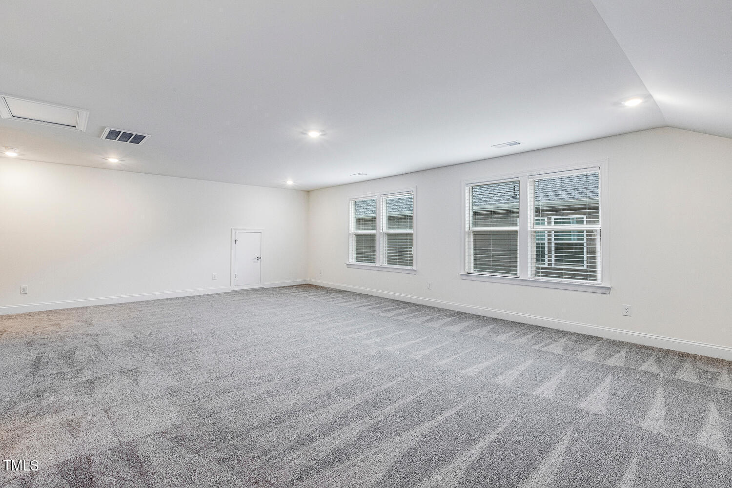 1116 Ciandra Barn Way Apex, NC 27523 - Photo 39 of 59 a view of an empty room with a window