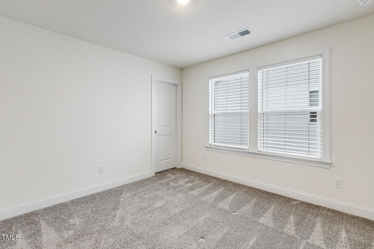 1116 Ciandra Barn Way Apex, NC 27523 - Photo 42 of 59 a view of an empty room with a window