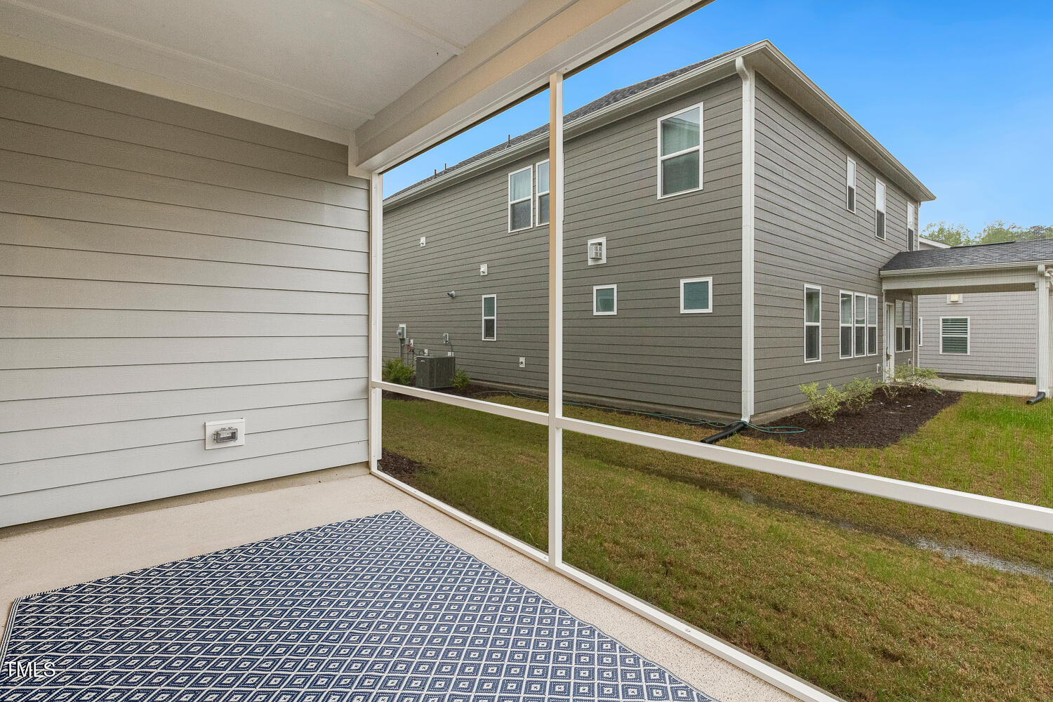 1116 Ciandra Barn Way Apex, NC 27523 - Photo 45 of 59 a view of a house with a backyard
