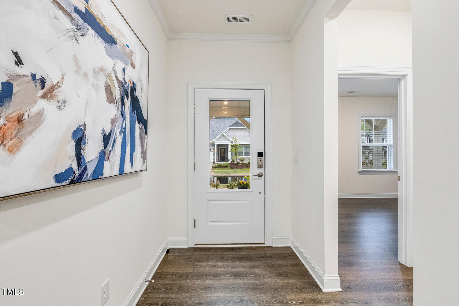 1116 Ciandra Barn Way Apex, NC 27523 - Photo 5 of 59 a view of an entryway with wooden floor