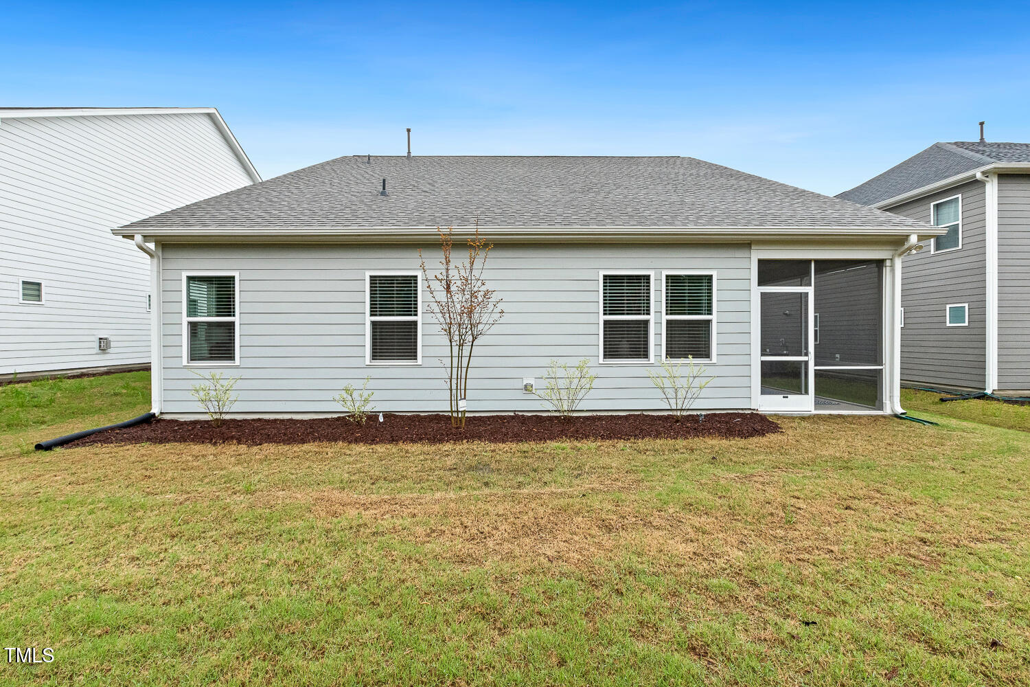1116 Ciandra Barn Way Apex, NC 27523 - Photo 52 of 59 a front view of a house with a yard
