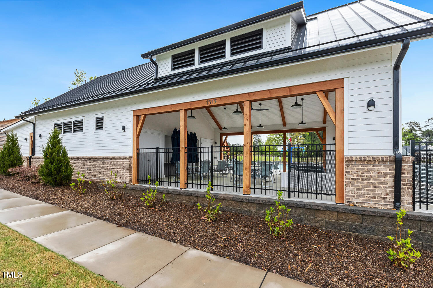 1116 Ciandra Barn Way Apex, NC 27523 - Photo 55 of 59 a view of a house with a backyard