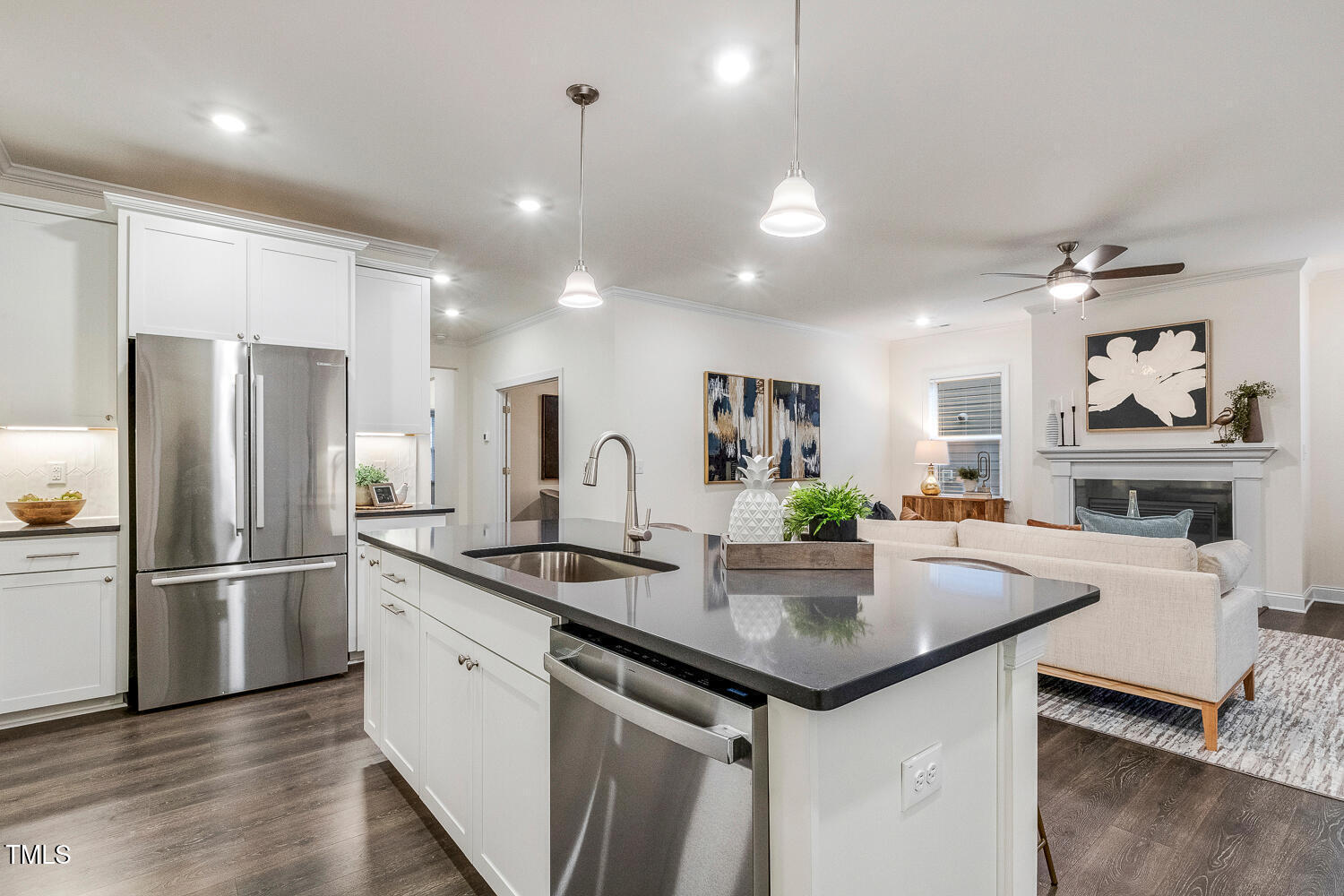 1116 Ciandra Barn Way Apex, NC 27523 - Photo 7 of 59 a kitchen with kitchen island a counter top space and stainless steel appliances