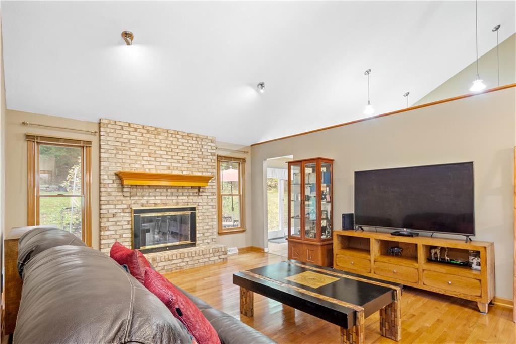 314 Glade Run Road Renfrew, PA 16053 - Photo 2 of 24 a living room with furniture and a flat screen tv