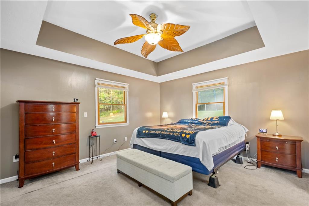 314 Glade Run Road Renfrew, PA 16053 - Photo 13 of 24 a bedroom with a bed and a dresser