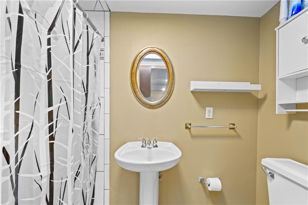 314 Glade Run Road Renfrew, PA 16053 - Photo 18 of 24 a bathroom with a sink and a mirror