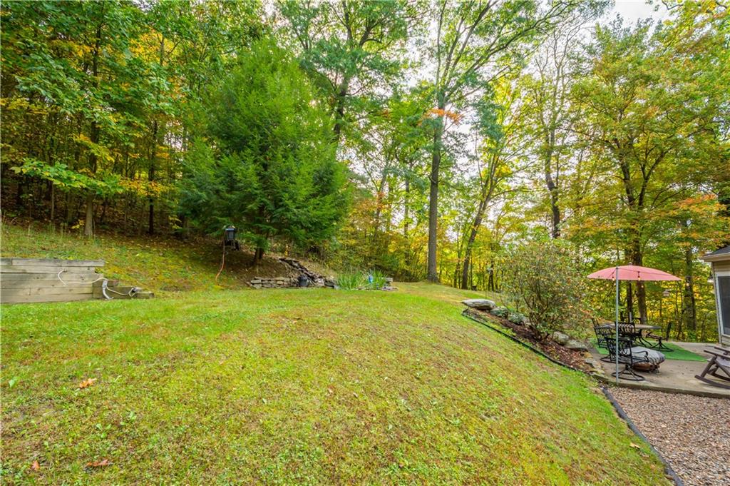 314 Glade Run Road Renfrew, PA 16053 - Photo 22 of 24 a view of a swimming pool and lounge chairs