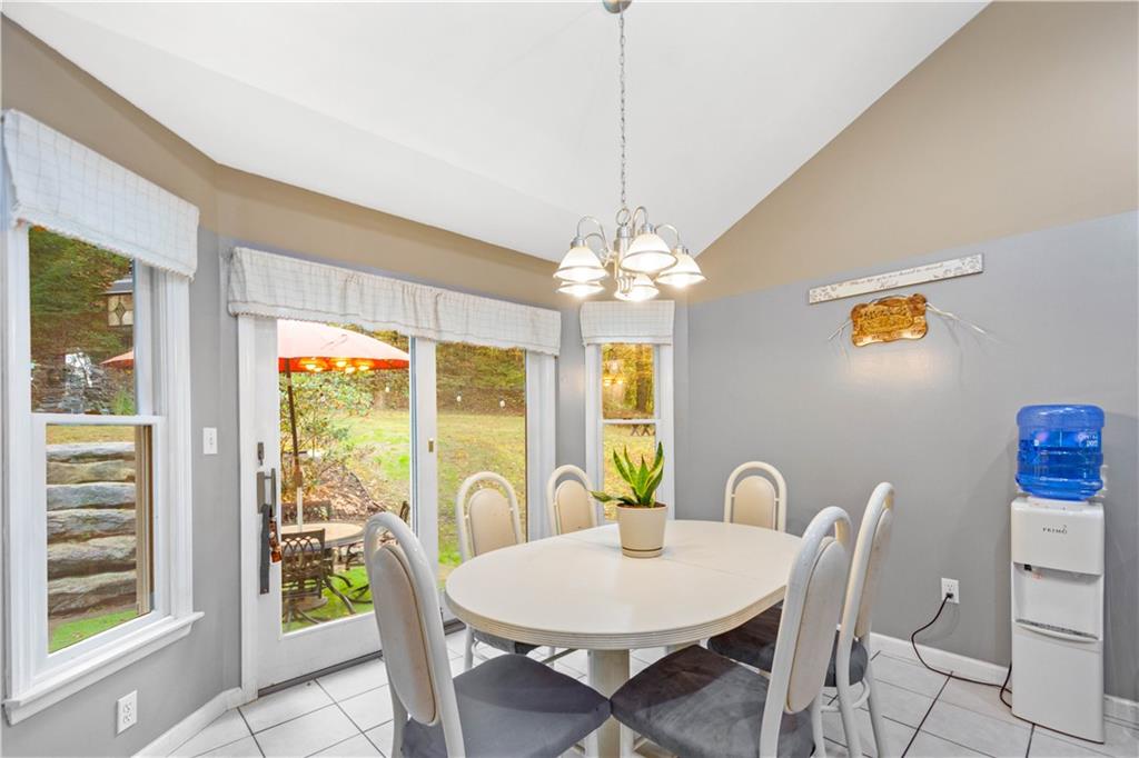 314 Glade Run Road Renfrew, PA 16053 - Photo 9 of 24 a view of a dining room with furniture window and outside view