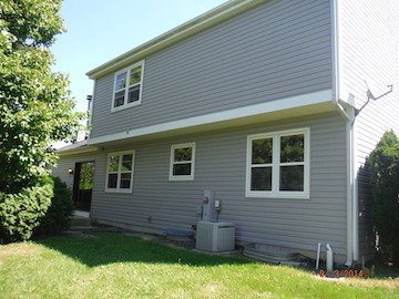 107 Country Court Bolingbrook, IL 60440 - Photo 13 of 13 a front view of a house with garden