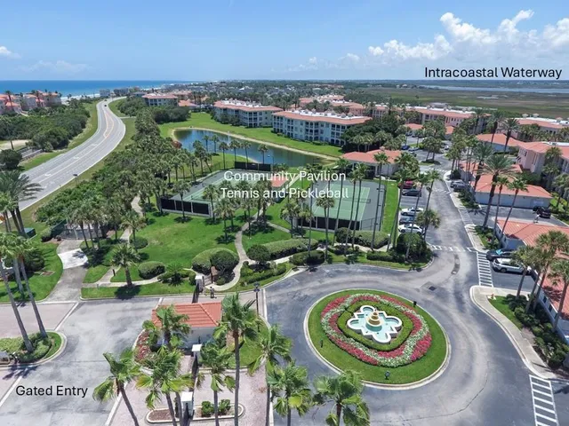 an aerial view of a golf course with furniture