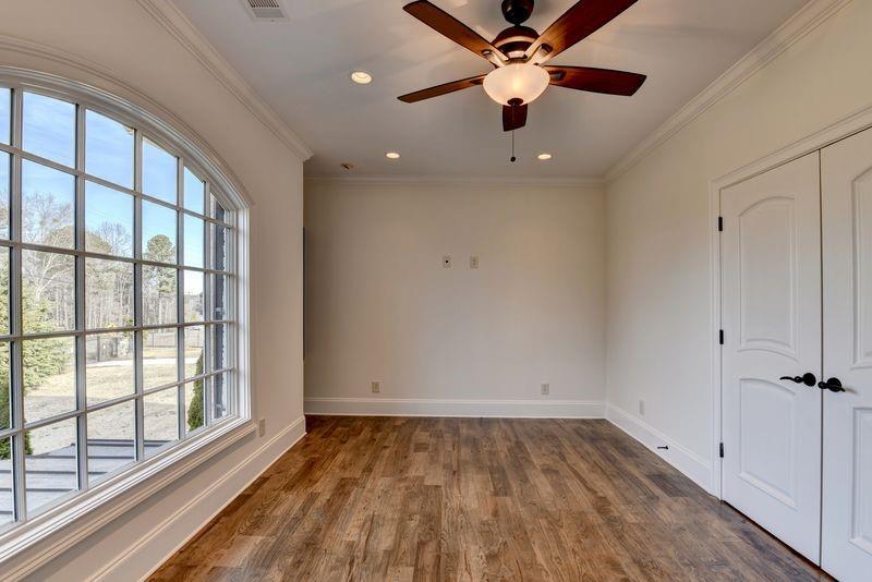 4045 Ridge Road Buford, GA 30519 - Photo 60 of 97 wooden floor in an empty room with a window