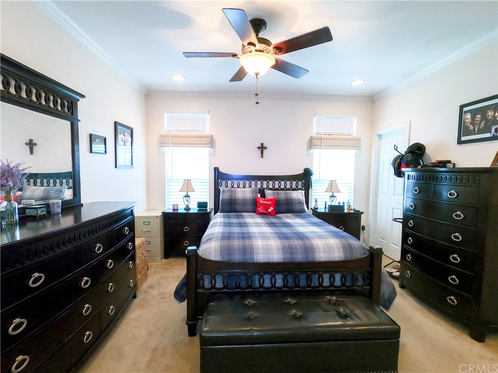 1051 Site Drive, Unit 286 Brea, CA 92821 - Photo 13 of 25 a bedroom with a bed and a dresser