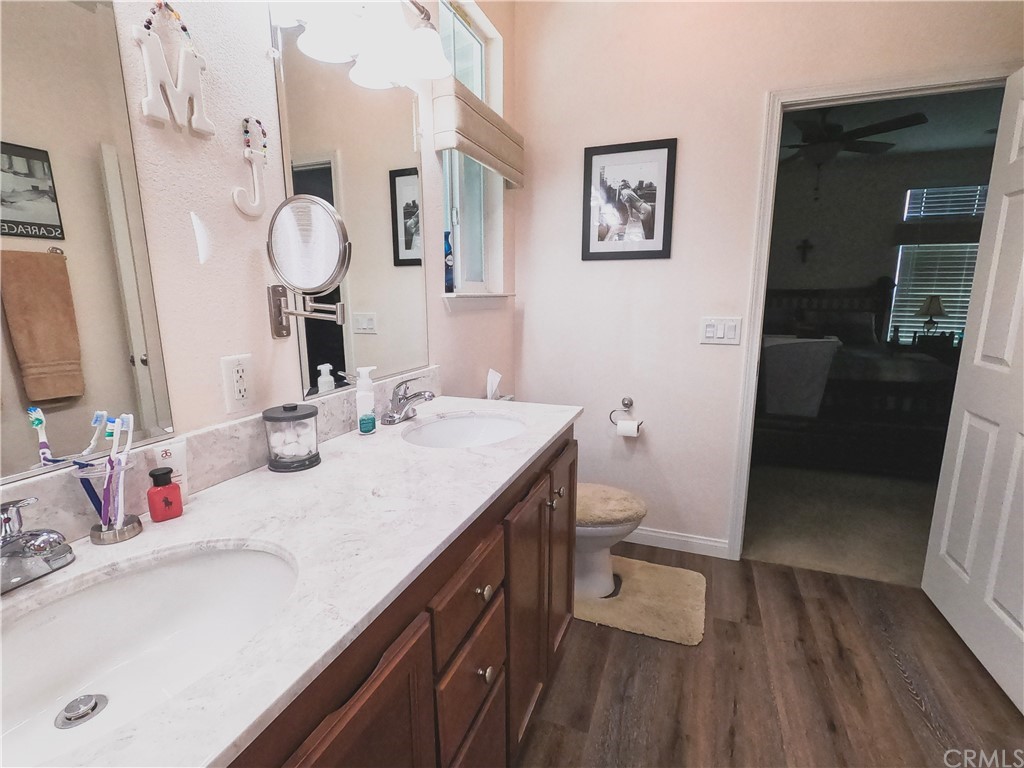 1051 Site Drive, Unit 286 Brea, CA 92821 - Photo 16 of 25 a bathroom with a sink vanity granite and toilet