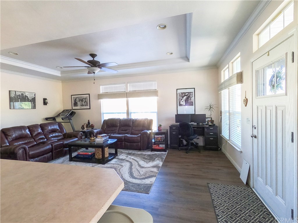 1051 Site Drive, Unit 286 Brea, CA 92821 - Photo 3 of 25 a living room with furniture window and wooden floor
