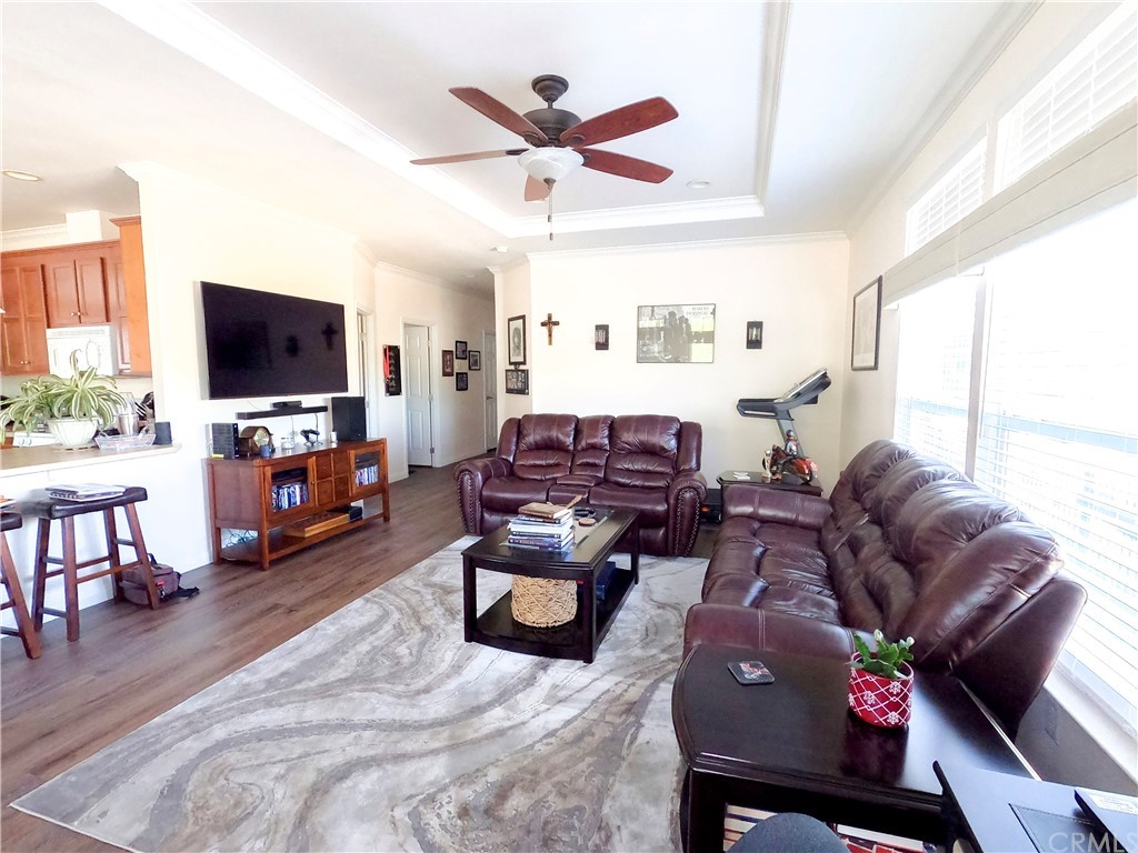 1051 Site Drive, Unit 286 Brea, CA 92821 - Photo 10 of 25 a living room with furniture and a flat screen tv