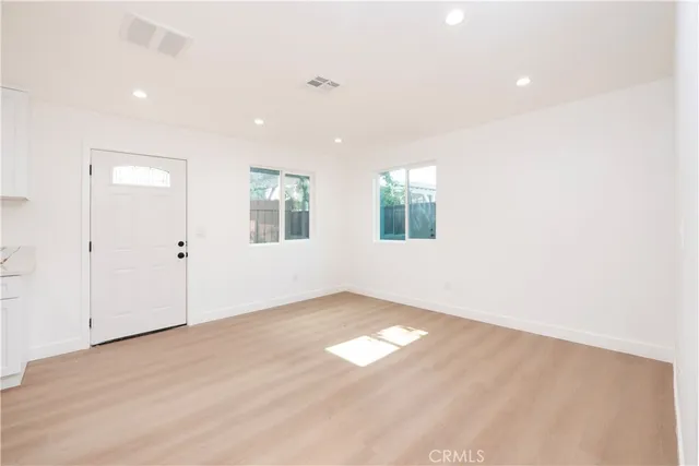 an empty room with windows