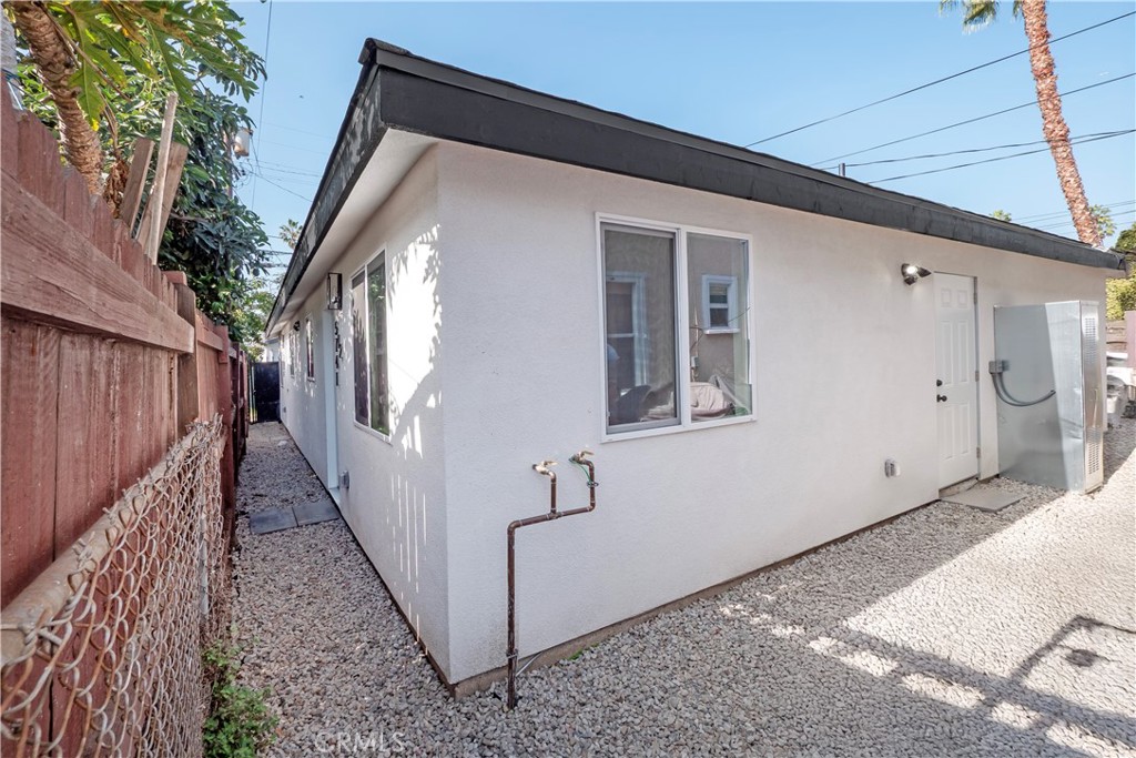 5741 South St Andrews Place, Unit 1/2 Los Angeles, CA 90062 - Photo 27 of 28 a view of a house with a street
