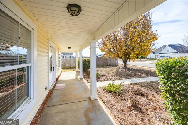 a view of a pathway with a balcony
