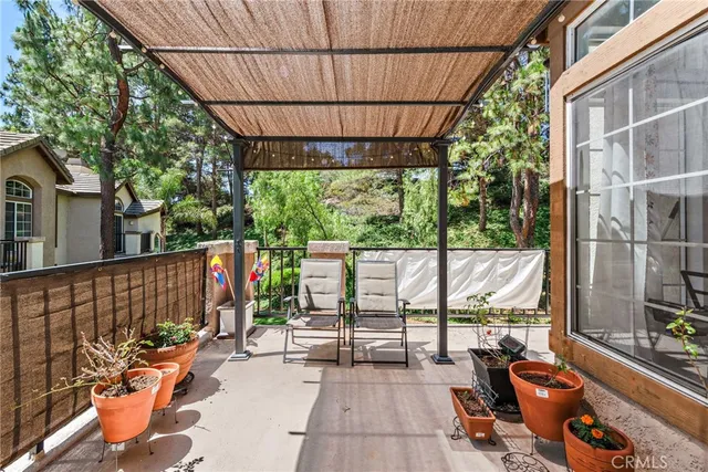 a view of porch with furniture