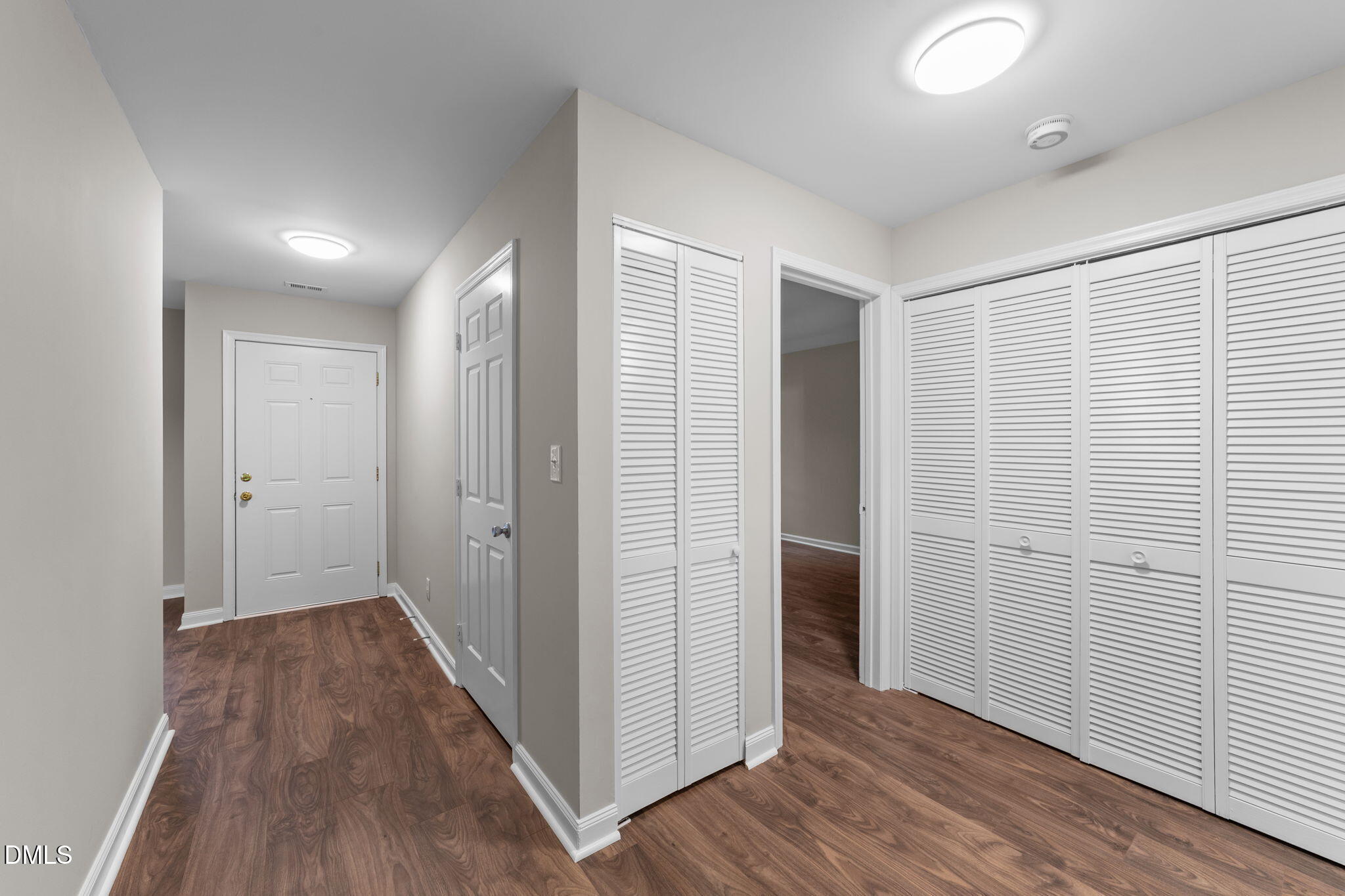 4110 Sedgewood Drive, Unit 302 Raleigh, NC 27612 - Photo 24 of 38 a view of hallway with wooden floor