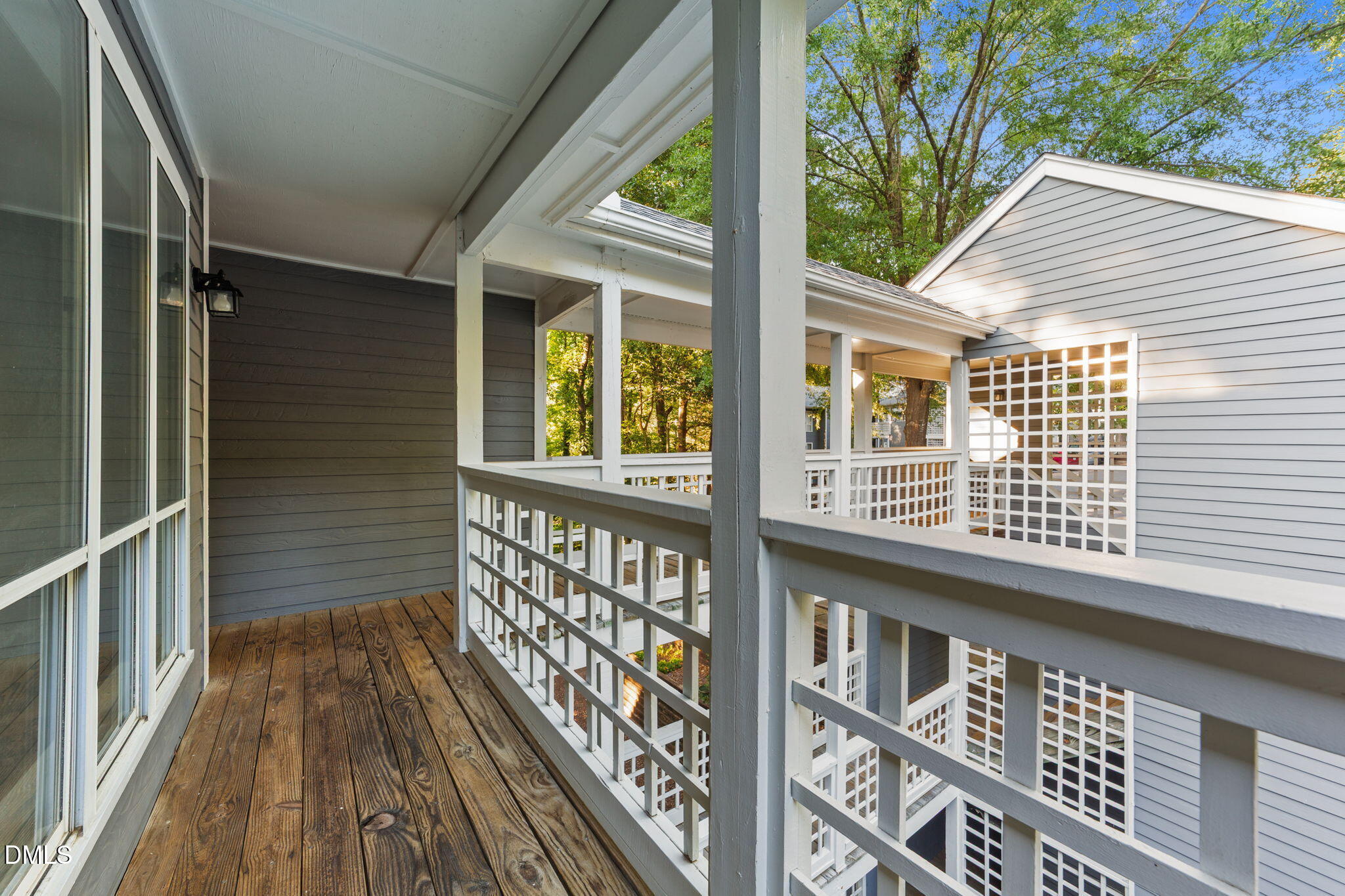 4110 Sedgewood Drive, Unit 302 Raleigh, NC 27612 - Photo 34 of 38 a view of a balcony with wooden floor