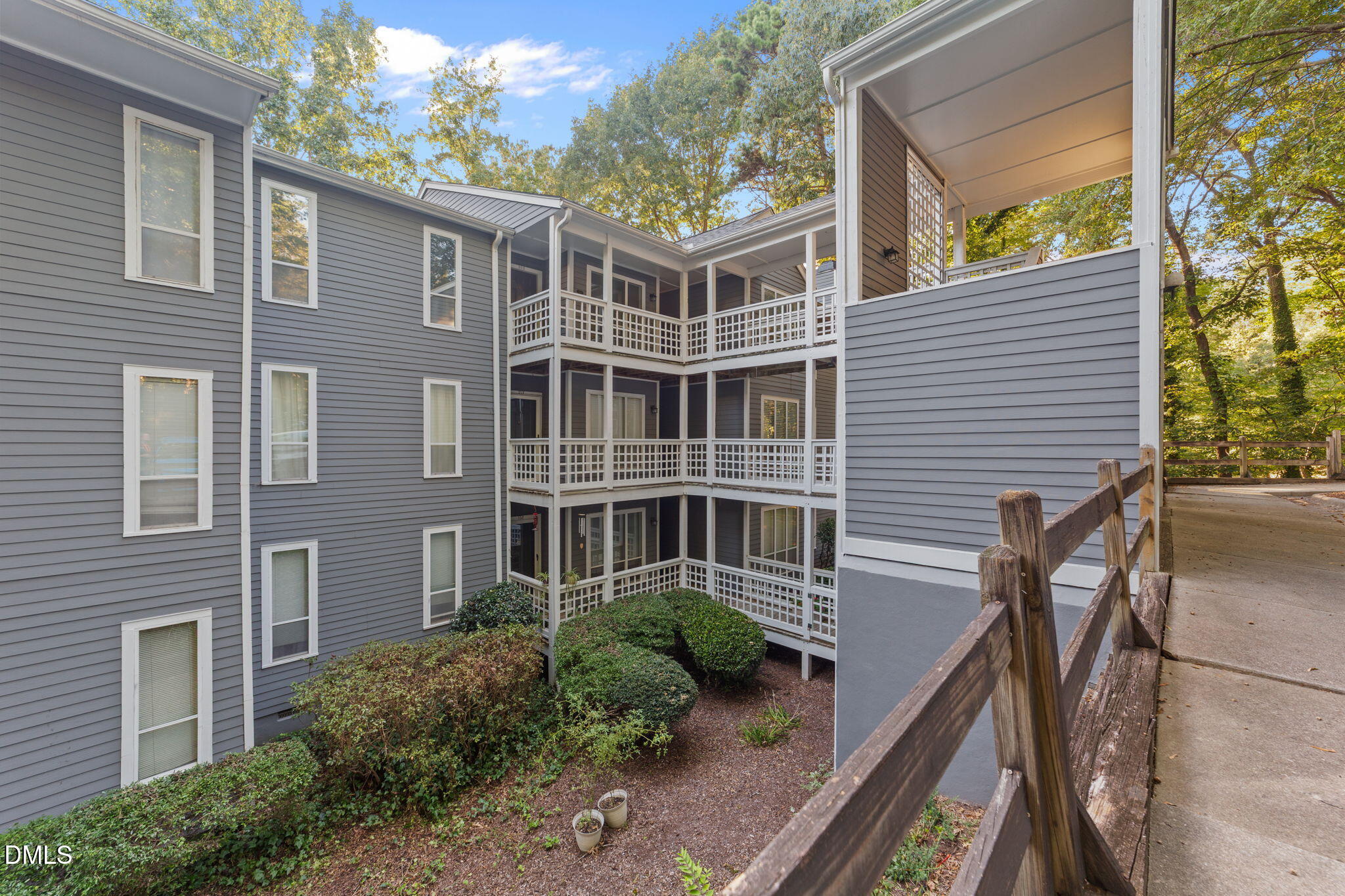 4110 Sedgewood Drive, Unit 302 Raleigh, NC 27612 - Photo 35 of 38 a front view of a house with a yard