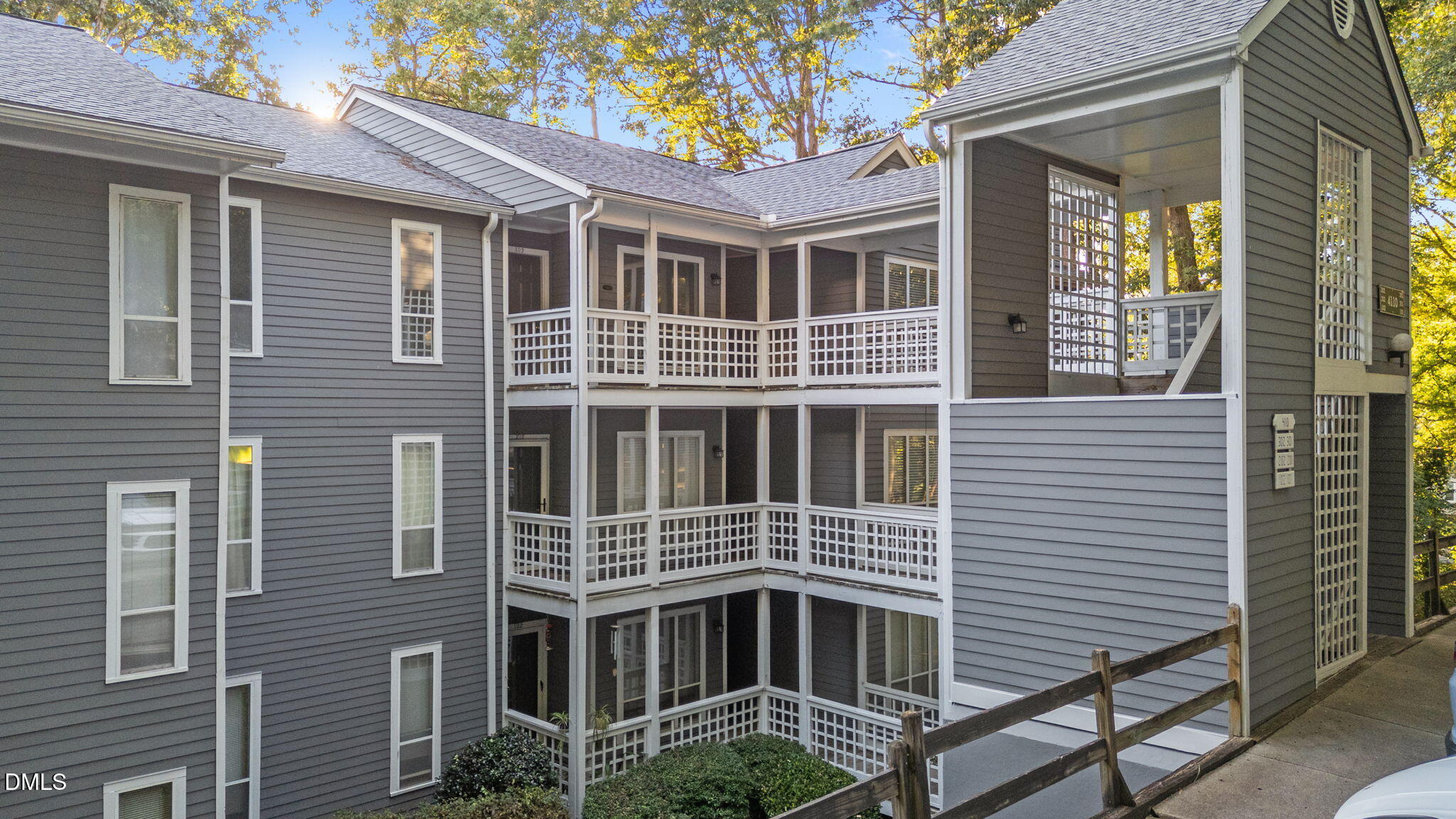 4110 Sedgewood Drive, Unit 302 Raleigh, NC 27612 - Photo 36 of 38 a front view of a house with a yard